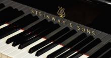 Keys of a piano that says Steinway and Sons