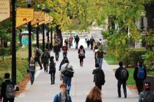 Students walk around UMN-TC campus